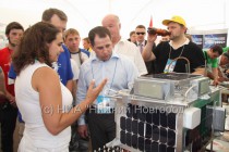 Полпред осматривает экспозицию молодежного форума