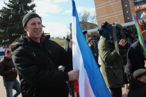 Участник митинга