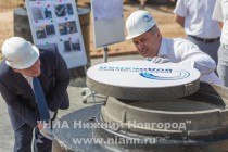 Глава администрации Нижнего Новгорода Олег Кондрашов и директор ОАО Нижегородский водоканал Сергей Агафонов 23 июня закрыли люк колодца нового коллектора