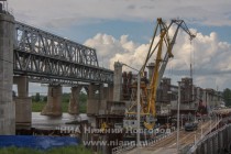 Строительные работы и подготовка к монтажу арочной пролетной конструкции на дублере Борского моста в Нижнем Новгороде