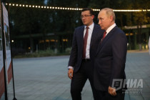 Владимир Путин и Глеб Никитин в парке Швейцария